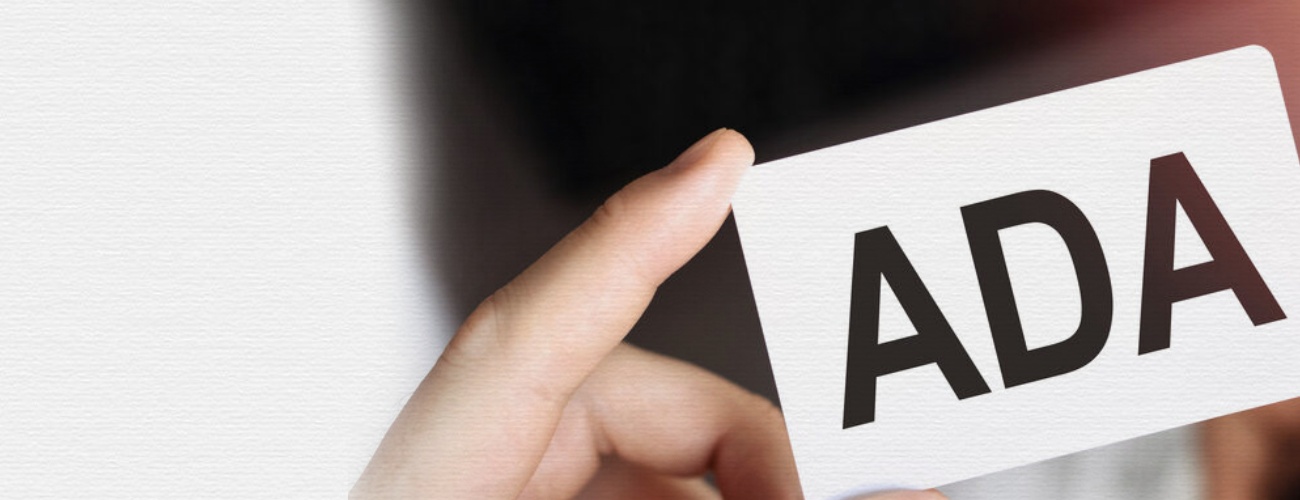 grok-image-ab52af73-db30-483b-82be-a63ed86fc5e0 Business concept. Card with letters ADA - Americans with Disabilities Act.