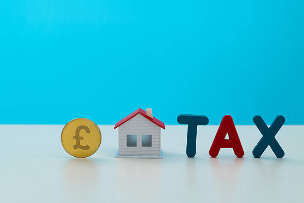 Model house and word TAX