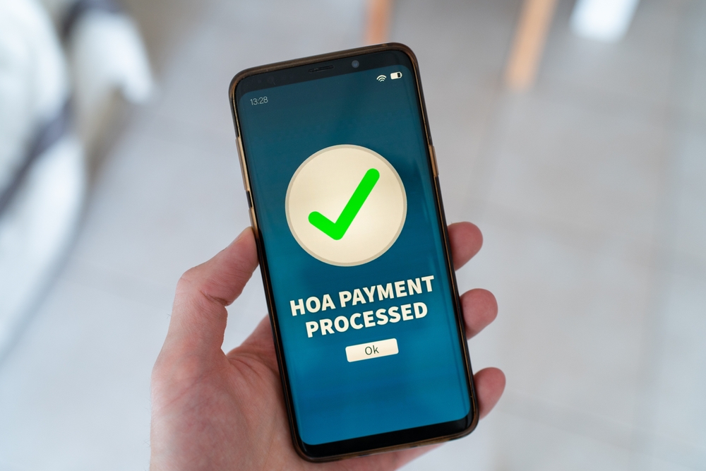 A HOA payment processed notification on smart phone.