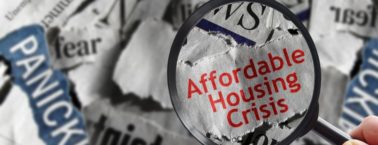 grok-image-ab52af73-db30-483b-82be-a63ed86fc5e0 Affordable Housing Crisis newspaper headline and magnifying glass