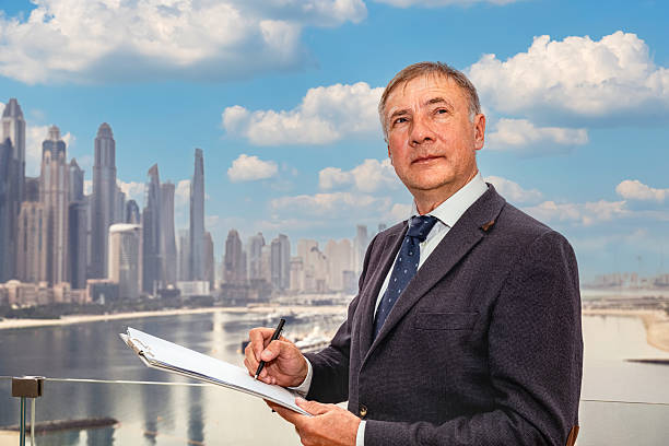 Dubai,Man Analyzes contract or document for signing, UAE