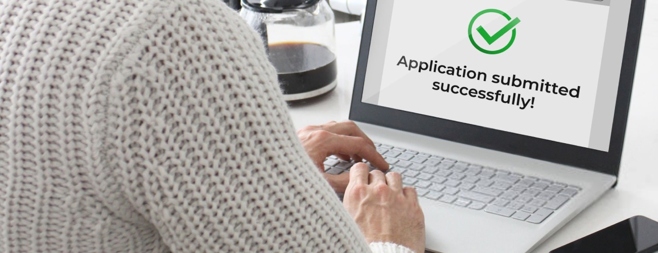 grok-image-ab52af73-db30-483b-82be-a63ed86fc5e0 Man submitting an application online.