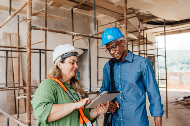 Engineers/supplier talking on site