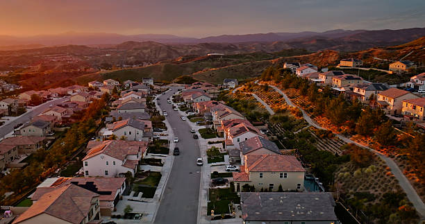 Aerial photograph of low-rise housing in Santa Clarita, CA. Shot at sunset.