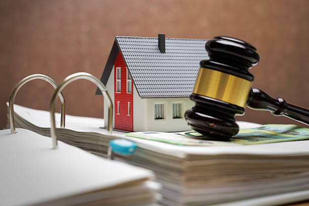 House, money and judgment – ​​concept image of real estate law and financing