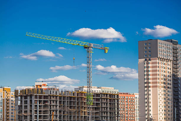 Modern high-rise apartment buildings on a sunny day. Construction of new residential areas. New buildings. Vidnoye, Leninsky district, Moscow region.