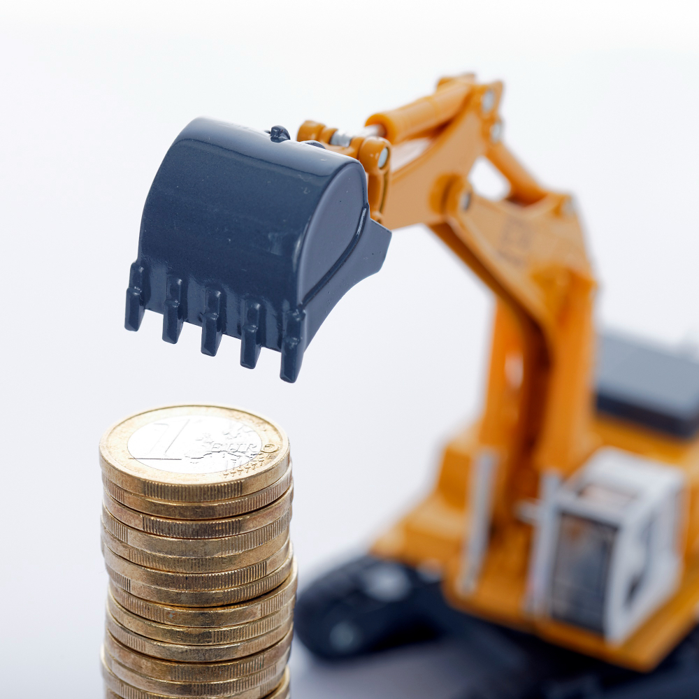 Euro money coins with digger on white space