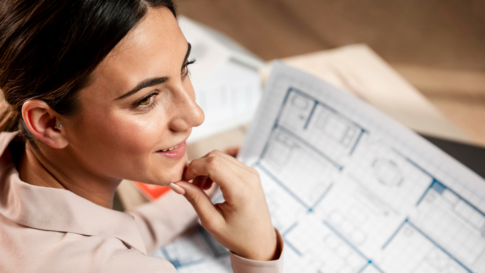 Close-up smiley woman with plans 