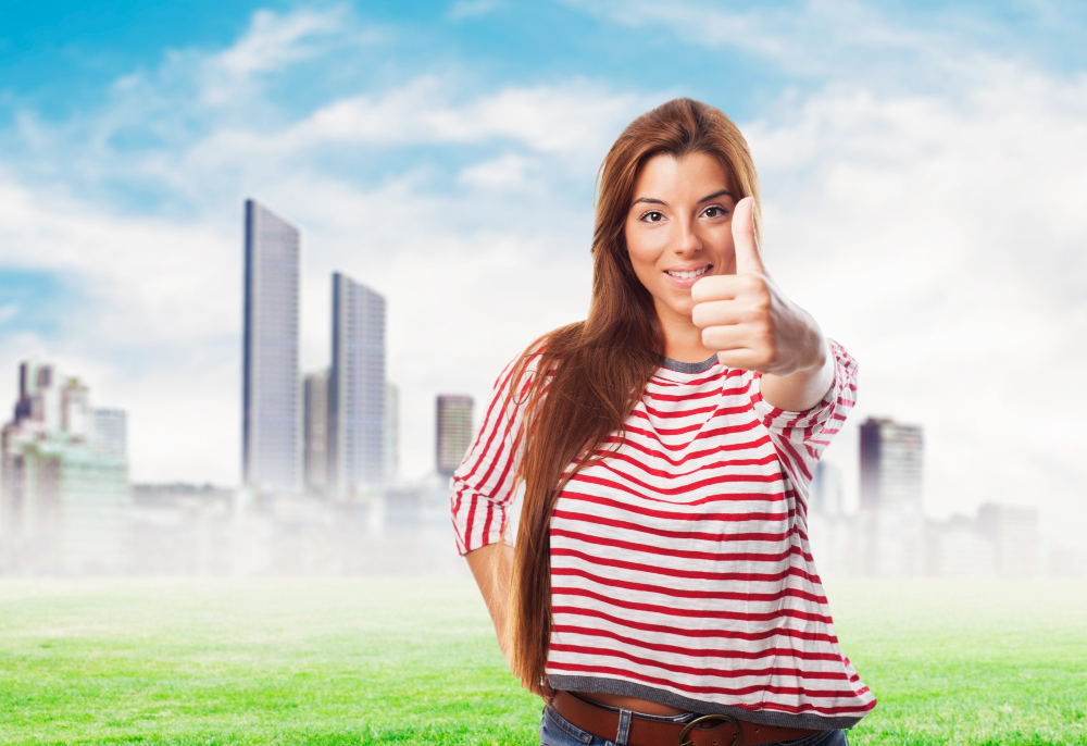 Beautiful girl showing thumb up 