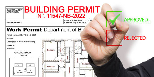 APPROVED BUILDINGS PERMIT CONCEPT in buildings activity and construction industry with approved residential building project and imaginary cadastral map