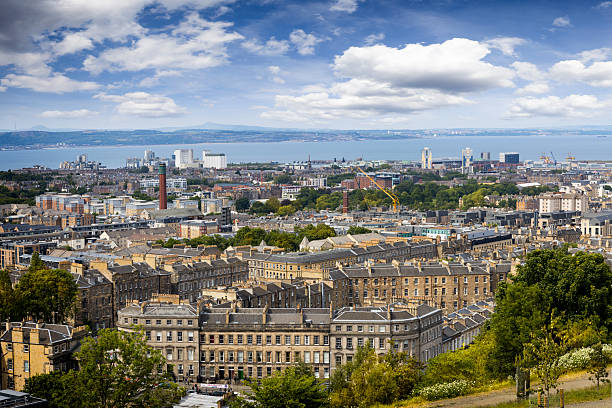 Holidays in Scotland - view of norht of Edinburgh from Calton Hill. The Firth of Forth can be seen in the far distance