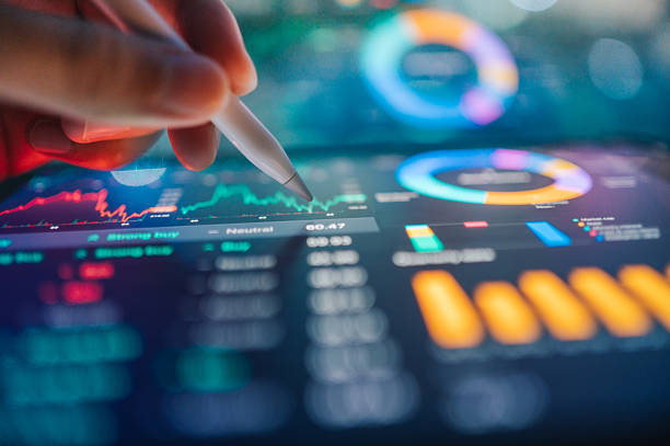 Millennial and Gen Z new investing using Ai finanace interact with an AI data finance assistant on a tablet, showcasing the integration of artificial intelligence in financial management.