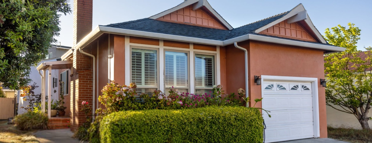 Stock photo of the exterior of a home in Northern California, along the coast in Pacifica.