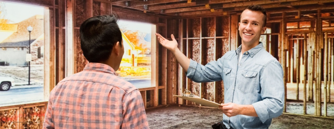 Smiling building contractor presenting